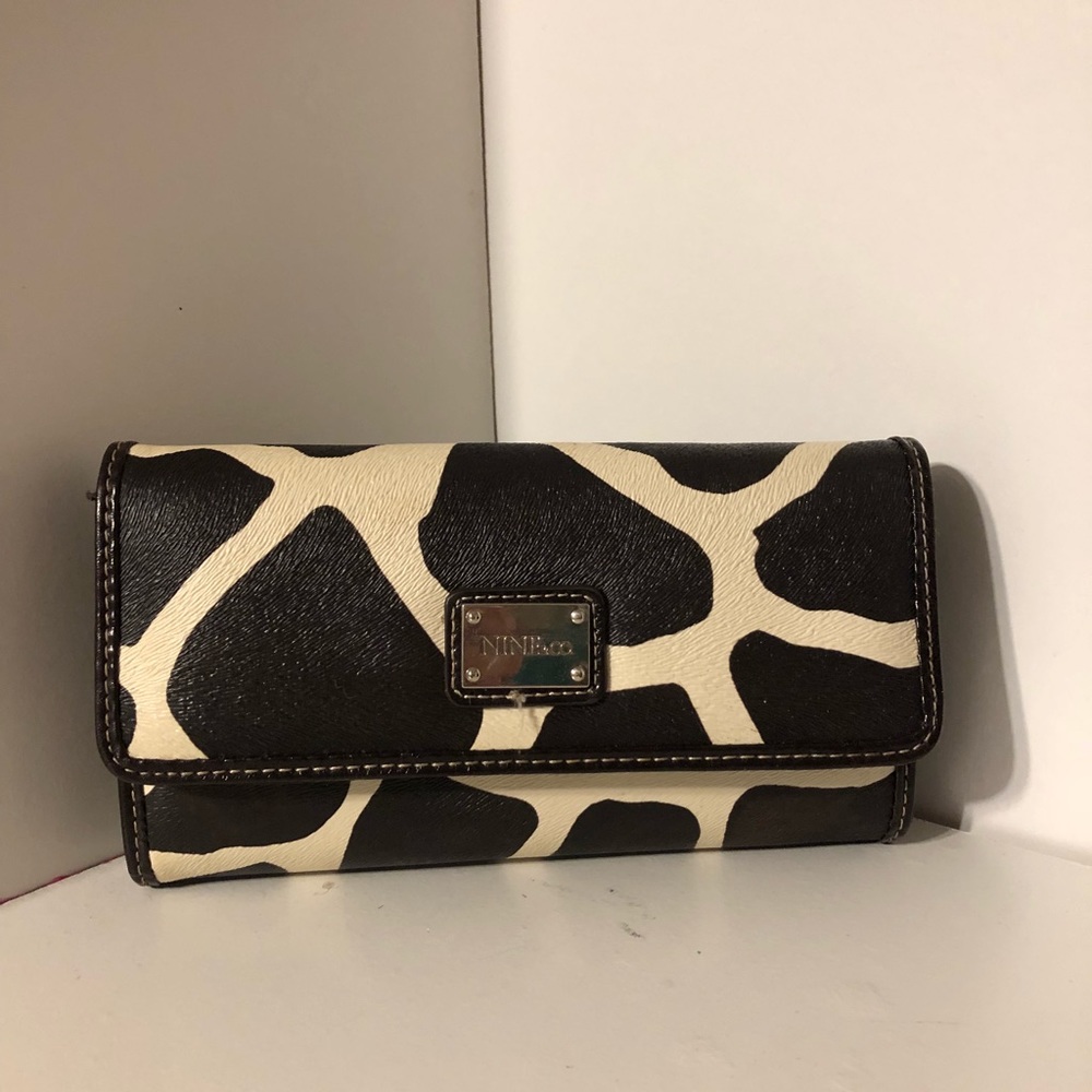 A cow print Nine West wallet.